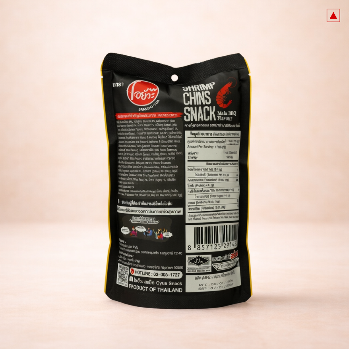 Black snack package with text and branding on a light pink background
