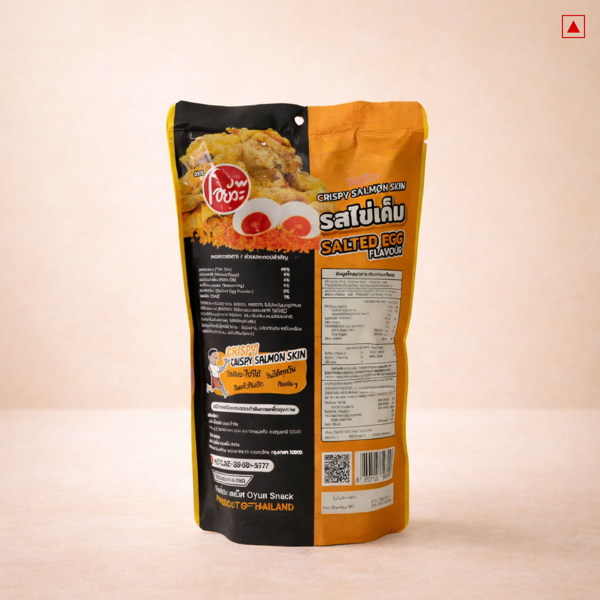 Snack package with orange and black design on a beige background