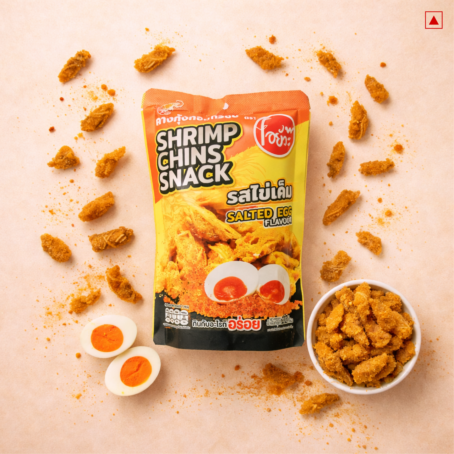 Shrimp chins snack packaging with scattered snacks and salted eggs on a beige background