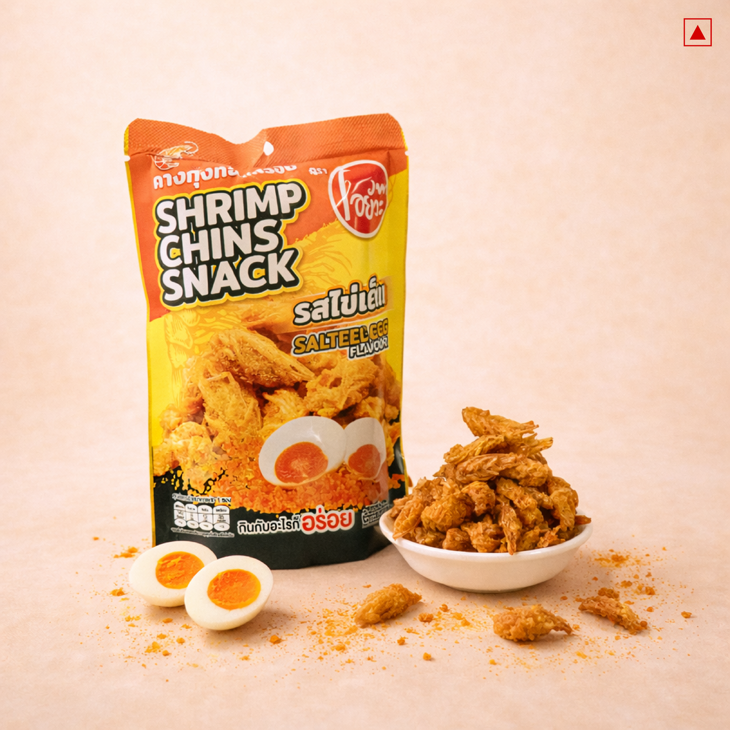 Shrimp chins snack packaging with snacks and ingredients on a beige background