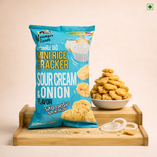 Packaged mini rice crackers with sour cream and onion flavor on a beige background