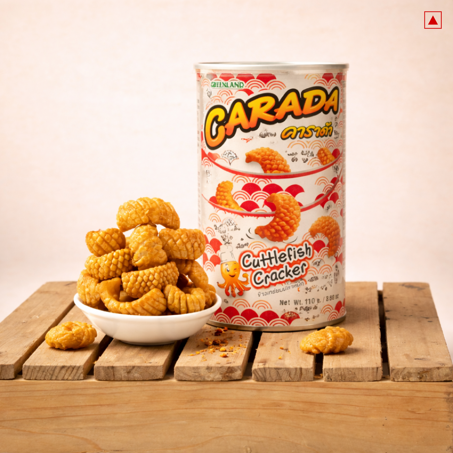Can of Carada Cuttlefish Cracker with bowl of crackers on wooden surface