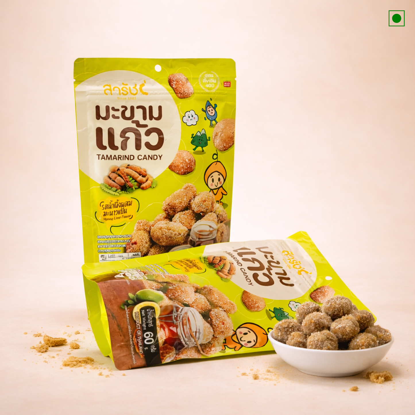 Tamarind candy packaging with a bowl of candy on a light background