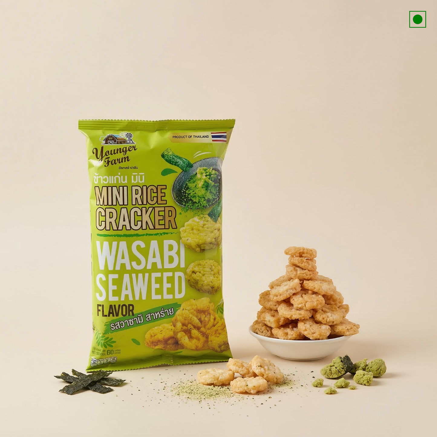 Packaging of Wasabi Seaweed Mini Rice Crackers with crackers on a beige background