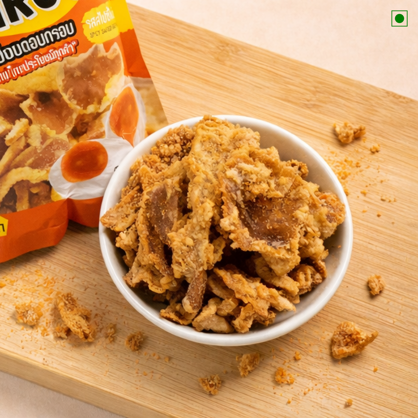 Salted egg oyster mushroom snack in a bowl on a wooden board