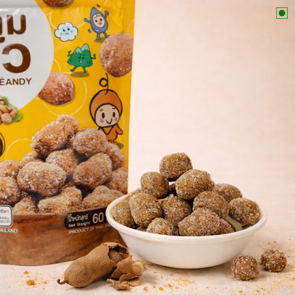 Tamarind Candy balls in a bowl with a packaging background